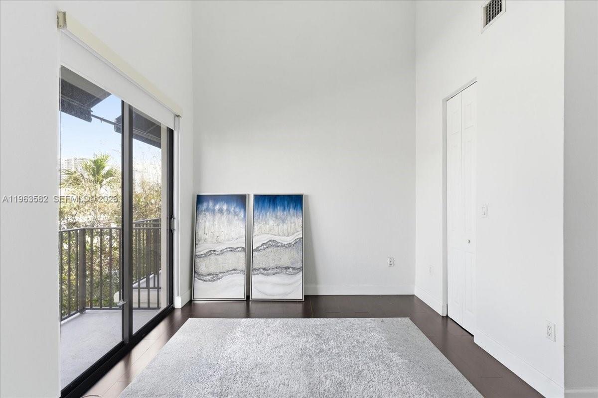 7743 Southwest 99th Street, Unit 2 Miami, FL 33156 - Photo 22 of 40 a view of an empty room and window
