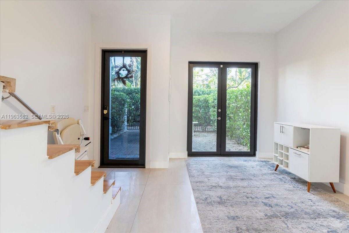 7743 Southwest 99th Street, Unit 2 Miami, FL 33156 - Photo 24 of 40 a view of a room with a large window