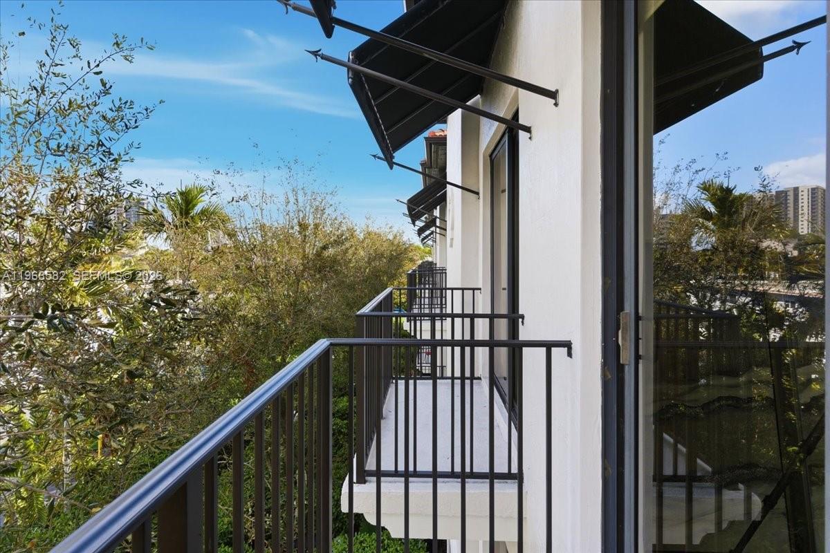 7743 Southwest 99th Street, Unit 2 Miami, FL 33156 - Photo 36 of 40 a view of a balcony