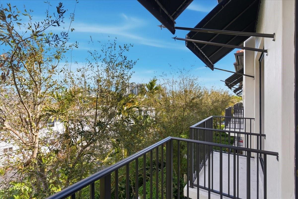 7743 Southwest 99th Street, Unit 2 Miami, FL 33156 - Photo 37 of 40 a view of a balcony