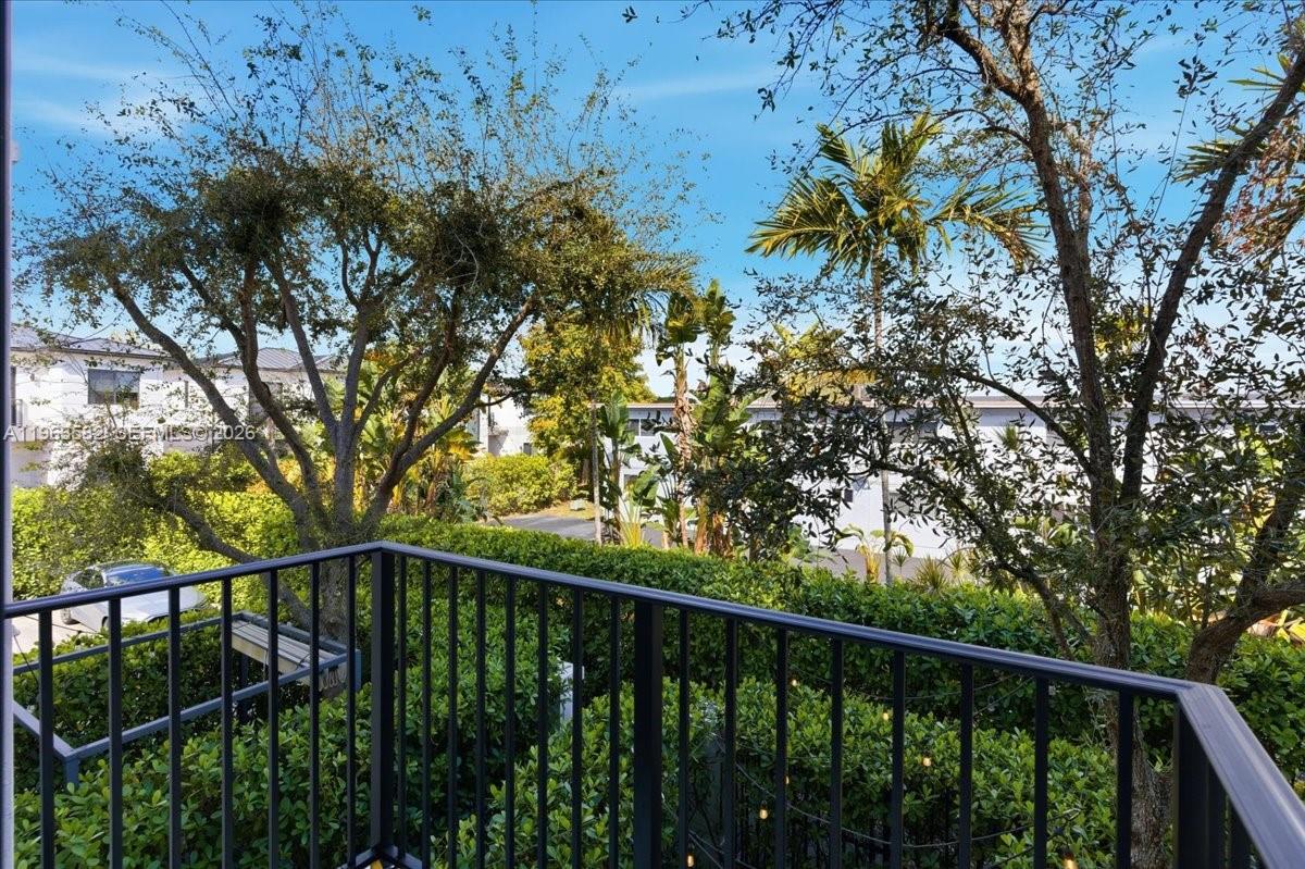 7743 Southwest 99th Street, Unit 2 Miami, FL 33156 - Photo 38 of 40 a view of a balcony with a pot