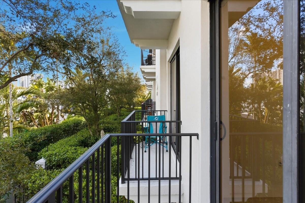 7743 Southwest 99th Street, Unit 2 Miami, FL 33156 - Photo 40 of 40 a view of a balcony with an outdoor space