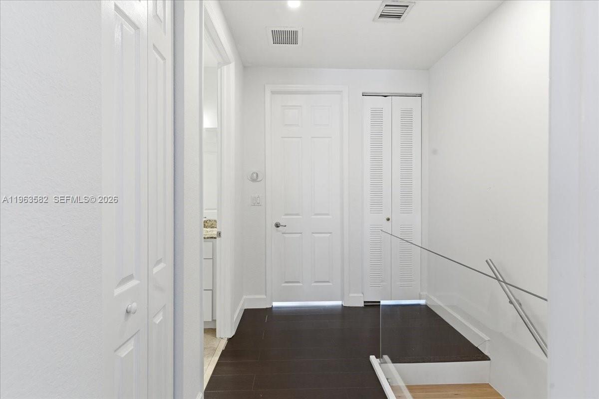 7743 Southwest 99th Street, Unit 2 Miami, FL 33156 - Photo 9 of 40 a view of an empty room