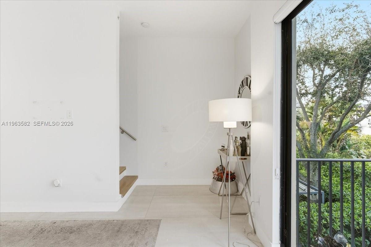 7743 Southwest 99th Street, Unit 2 Miami, FL 33156 - Photo 10 of 40 wooden floor in a gallery