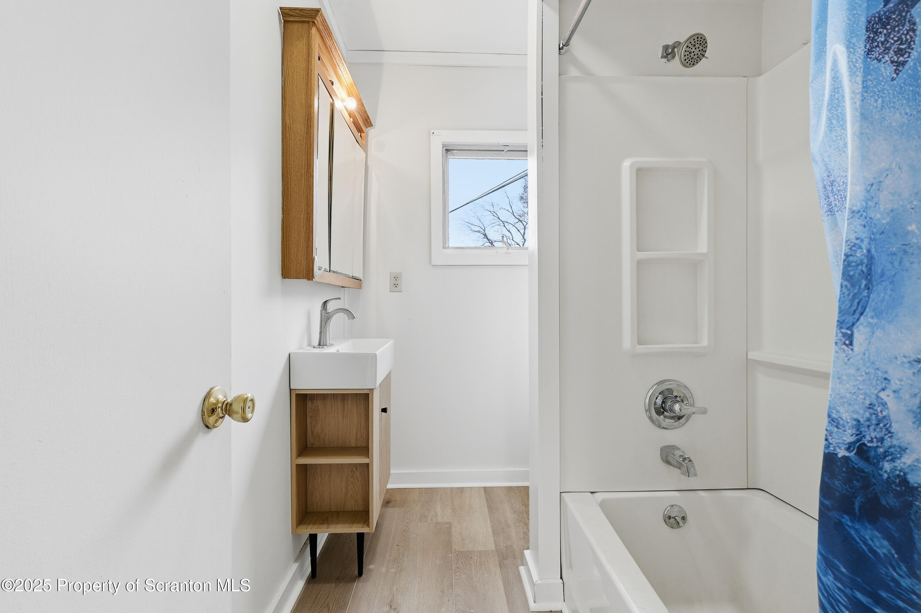 2521 North Main Avenue Scranton, PA 18508 - Photo 11 of 16 a bathroom with a bathtub and a sink
