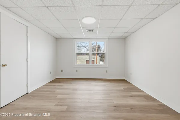 a bathroom with a bathtub and a sink