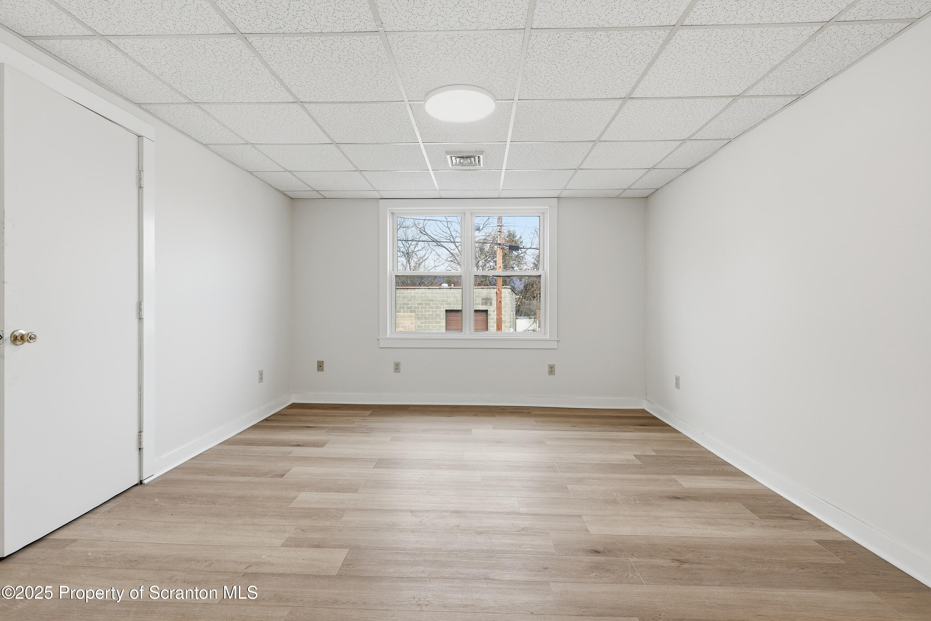 2521 North Main Avenue Scranton, PA 18508 - Photo 9 of 16 a view of an empty room and window