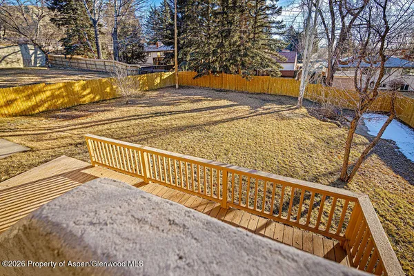 a front view of a house with a space and garage