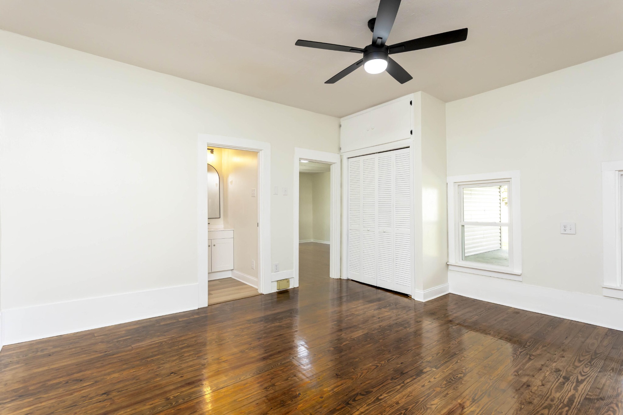 124 Gothard Road Sale Creek, TN 37373 - Photo 15 of 56 a view of an empty room with wooden floor and a window