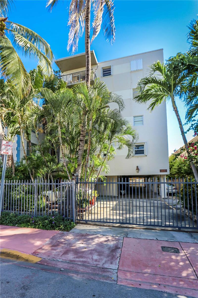 1605 Meridian Avenue, Unit 401 Miami Beach, FL 33139 - Photo 1 of 14 a view of a house with a yard