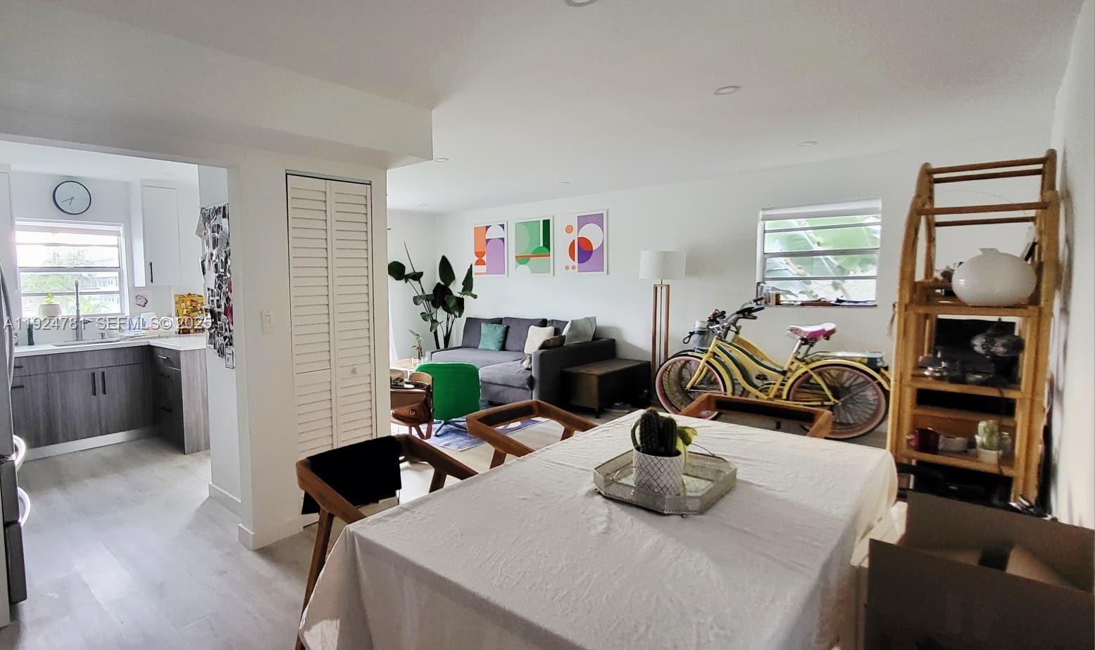 1605 Meridian Avenue, Unit 401 Miami Beach, FL 33139 - Photo 4 of 14 a bedroom with furniture and a window