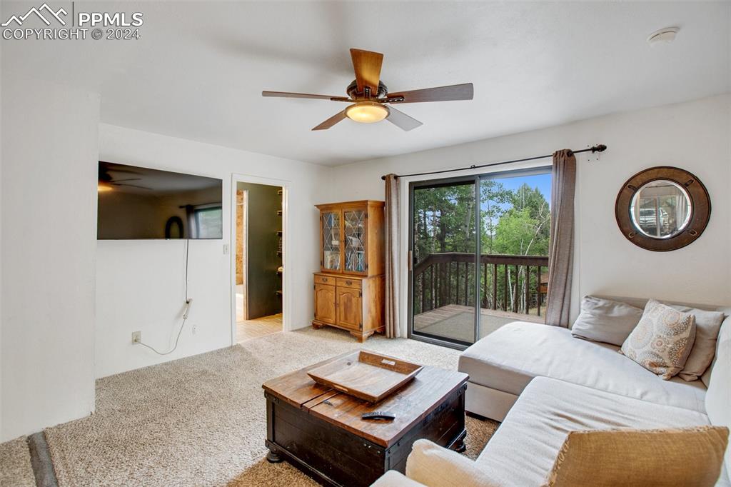 377 Ridge Road Divide, CO 80814 - Photo 25 of 50 a living room with furniture and a large window
