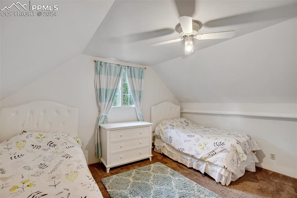 377 Ridge Road Divide, CO 80814 - Photo 36 of 50 a bedroom with a bed and a window