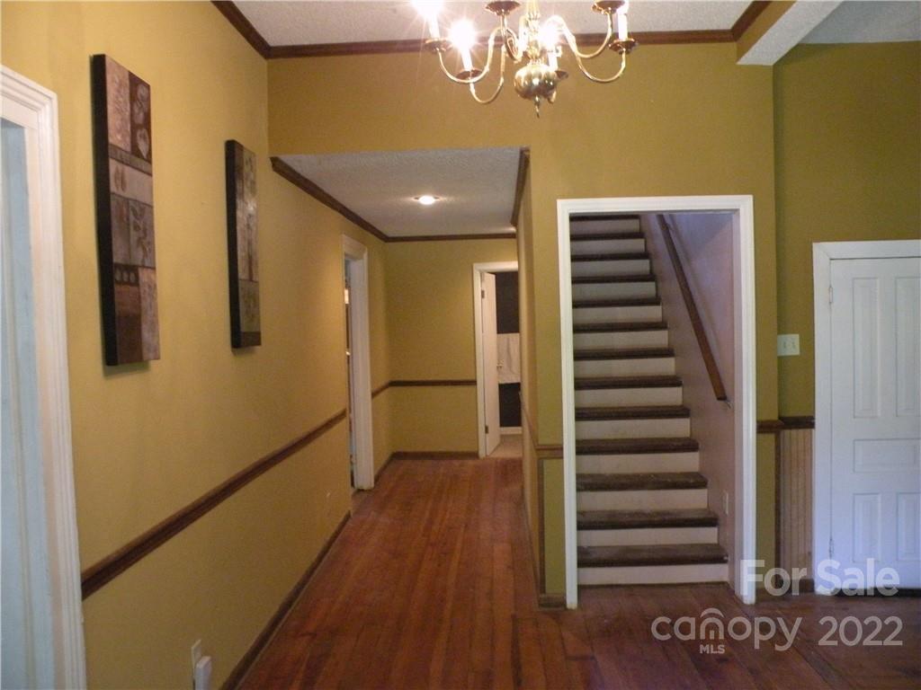 1423 Gold Hill Road, Unit 1 Fort Mill, SC 29708 - Photo 8 of 20 a view of a hallway with wooden floor and staircase