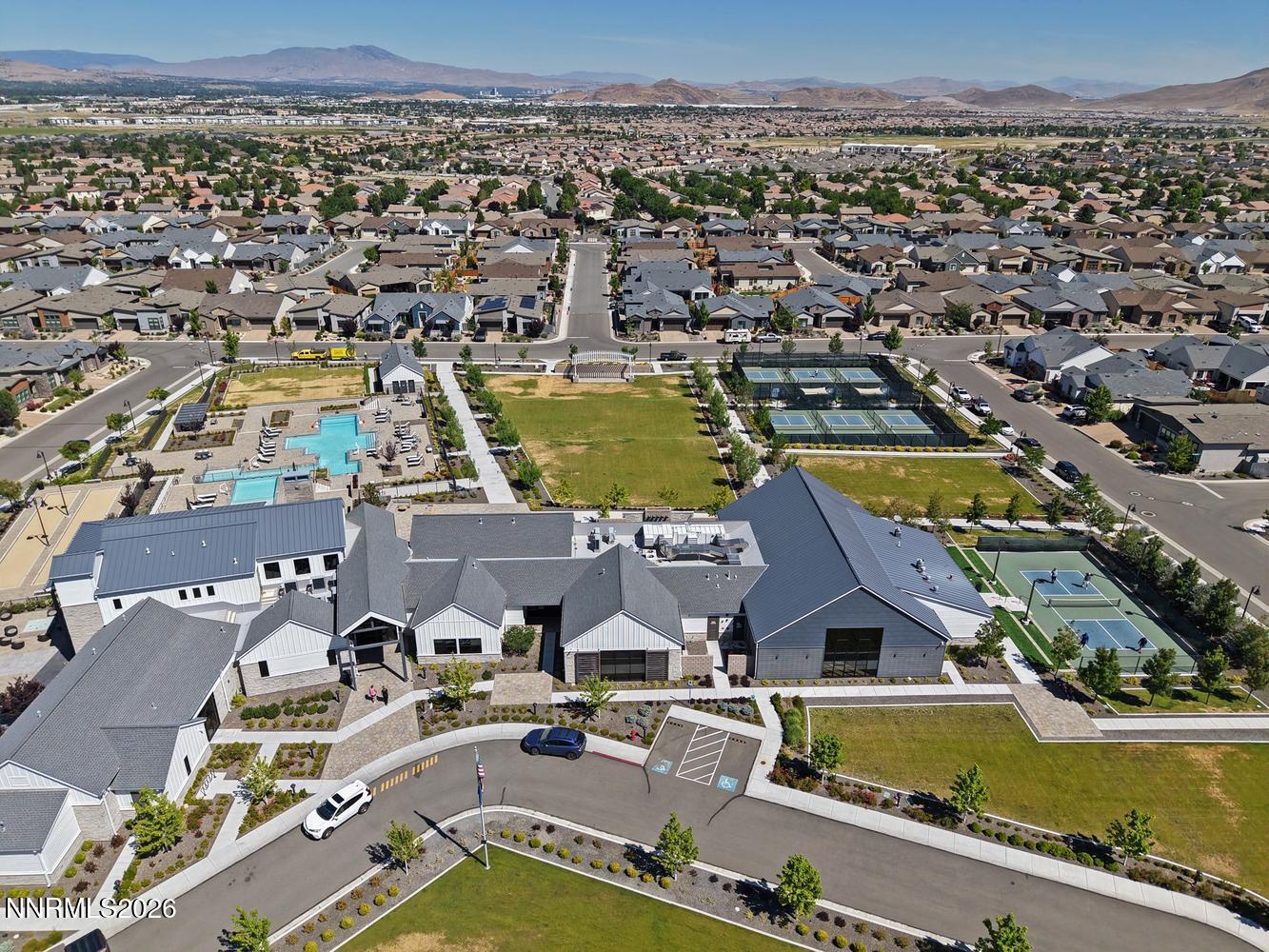 2332 Hammer Falls Drive Reno, NV 89521 - Photo 55 of 57 an aerial view of a house with a swimming pool