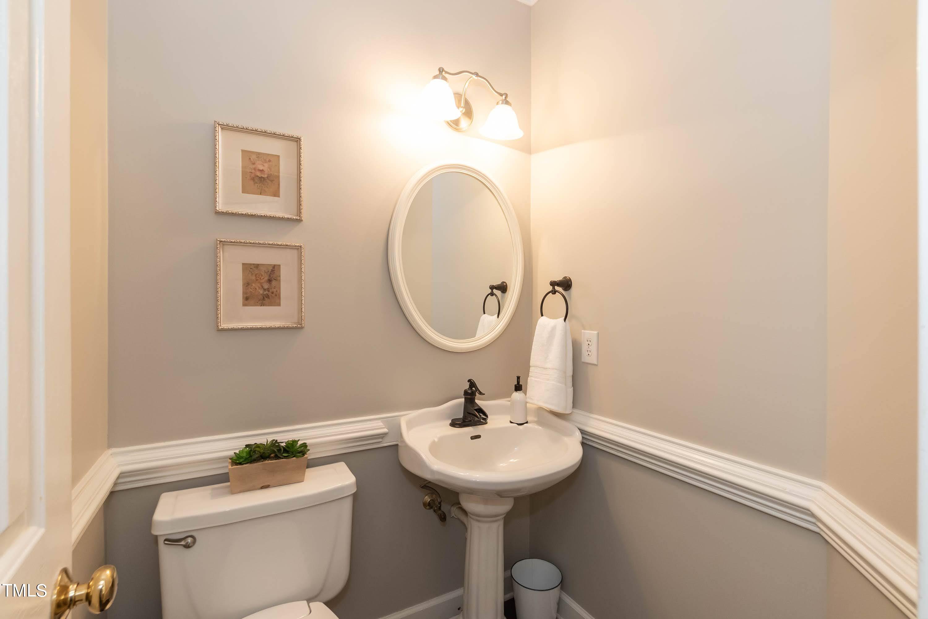 4112 Ridgebrook Bluffs Drive Raleigh, NC 27603 - Photo 18 of 40 Half bath on first floor