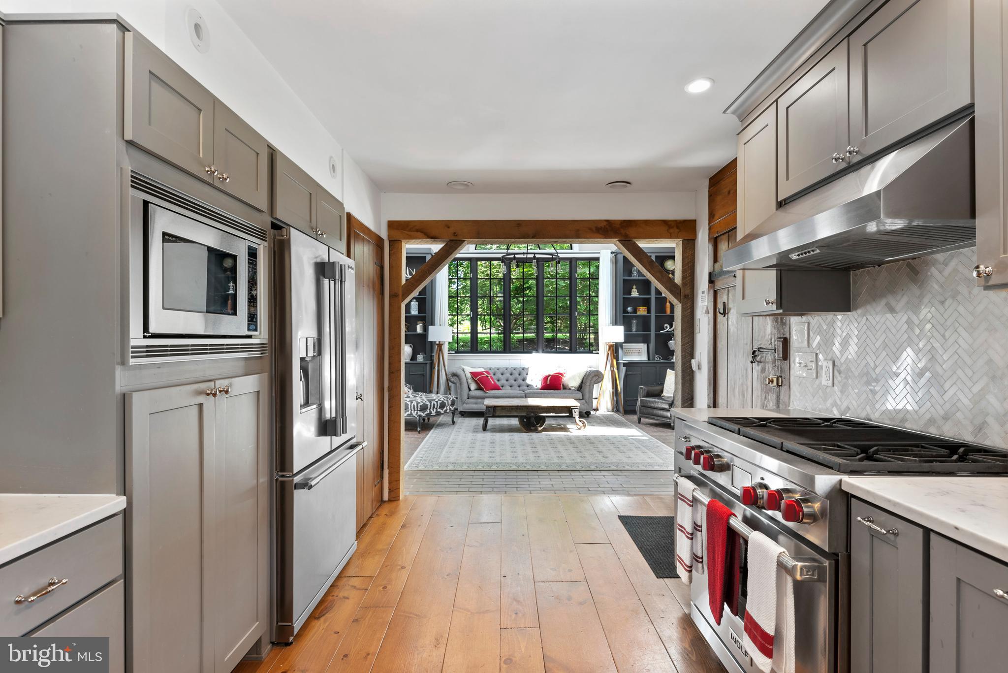 309 Swedesford Road Malvern, PA 19355 - Photo 11 of 36 Kitchen is ope to 2 story Family Room