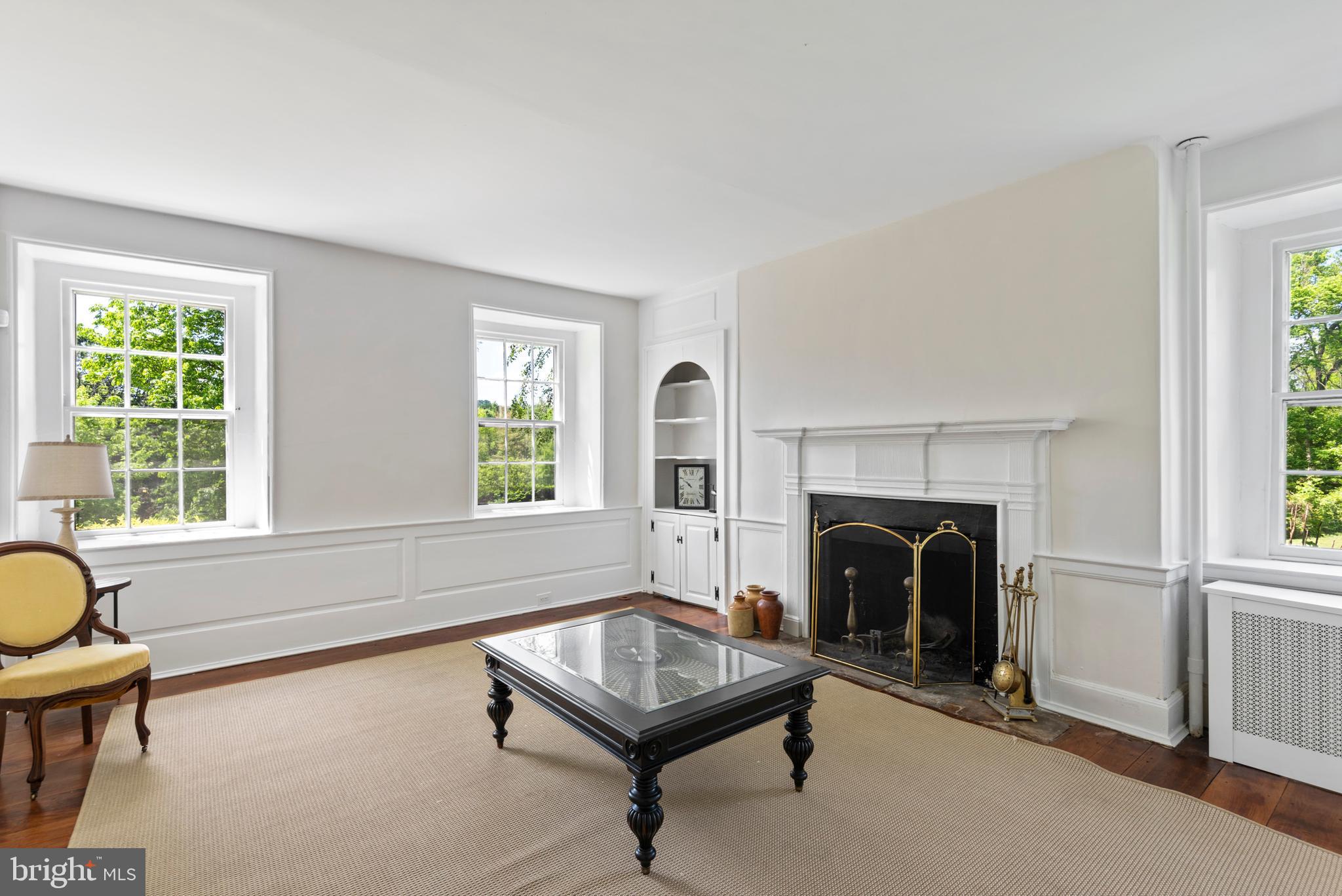 309 Swedesford Road Malvern, PA 19355 - Photo 5 of 36 Sun-drenched Living Room with fireplace