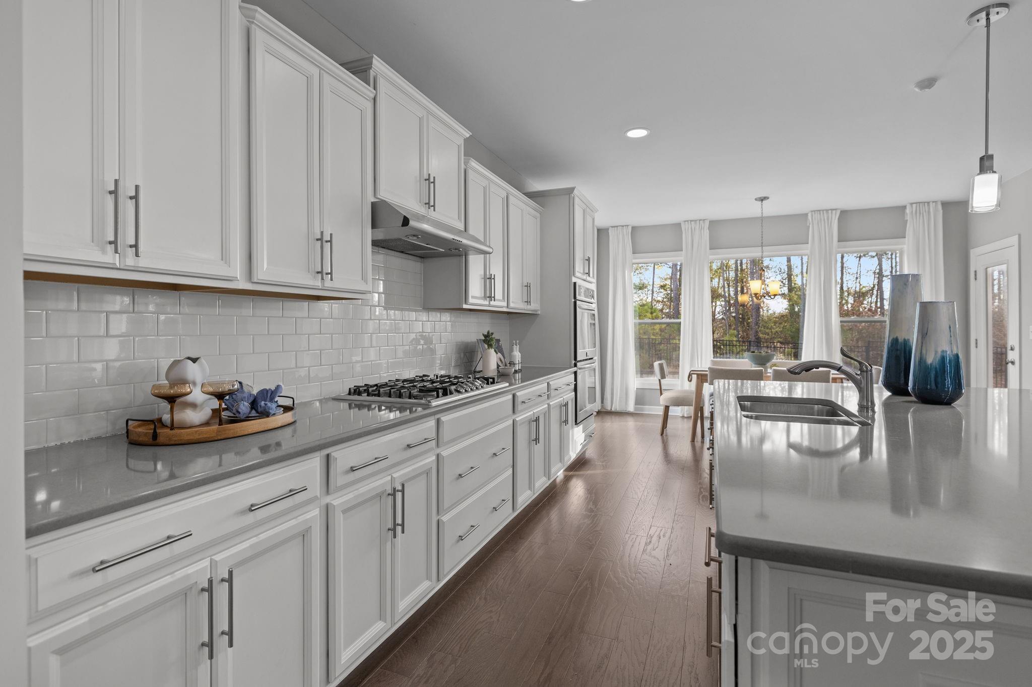 366 Hampton Trail Drive Fort Mill, SC 29708 - Photo 11 of 45 a kitchen with counter top space cabinets and stainless steel appliances