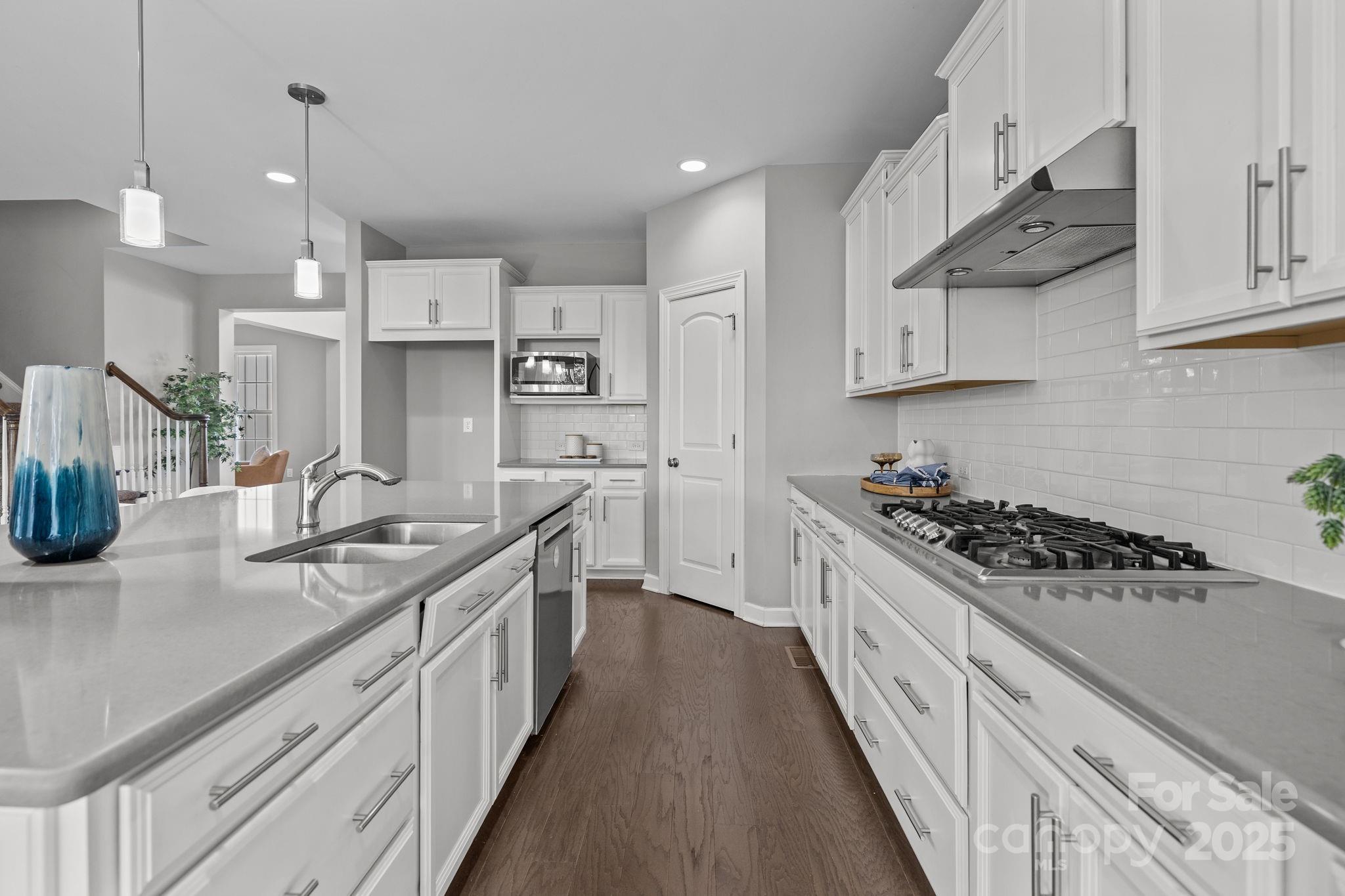 366 Hampton Trail Drive Fort Mill, SC 29708 - Photo 12 of 45 a kitchen with stainless steel appliances granite countertop a sink stove and refrigerator