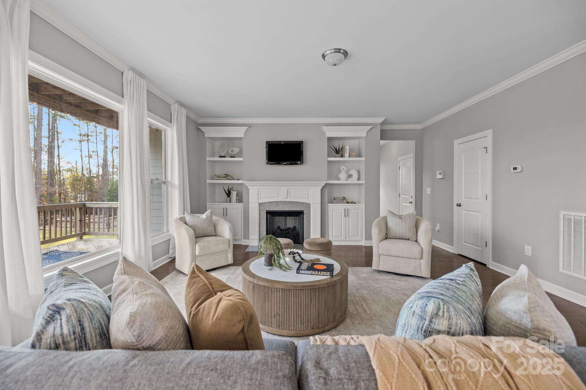 366 Hampton Trail Drive Fort Mill, SC 29708 - Photo 16 of 45 a living room with furniture fireplace and a large window