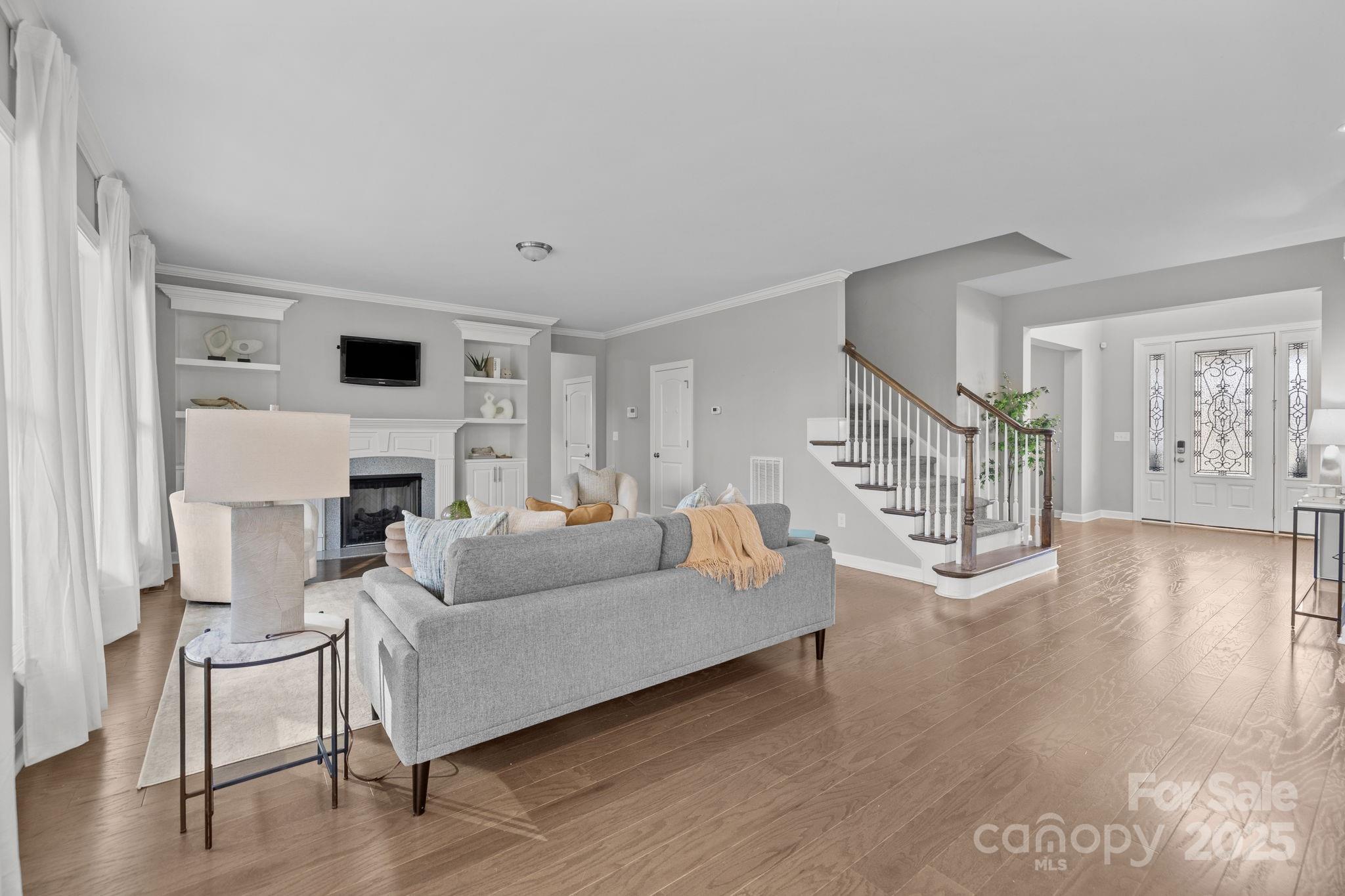 366 Hampton Trail Drive Fort Mill, SC 29708 - Photo 18 of 45 a living room with furniture and a fireplace