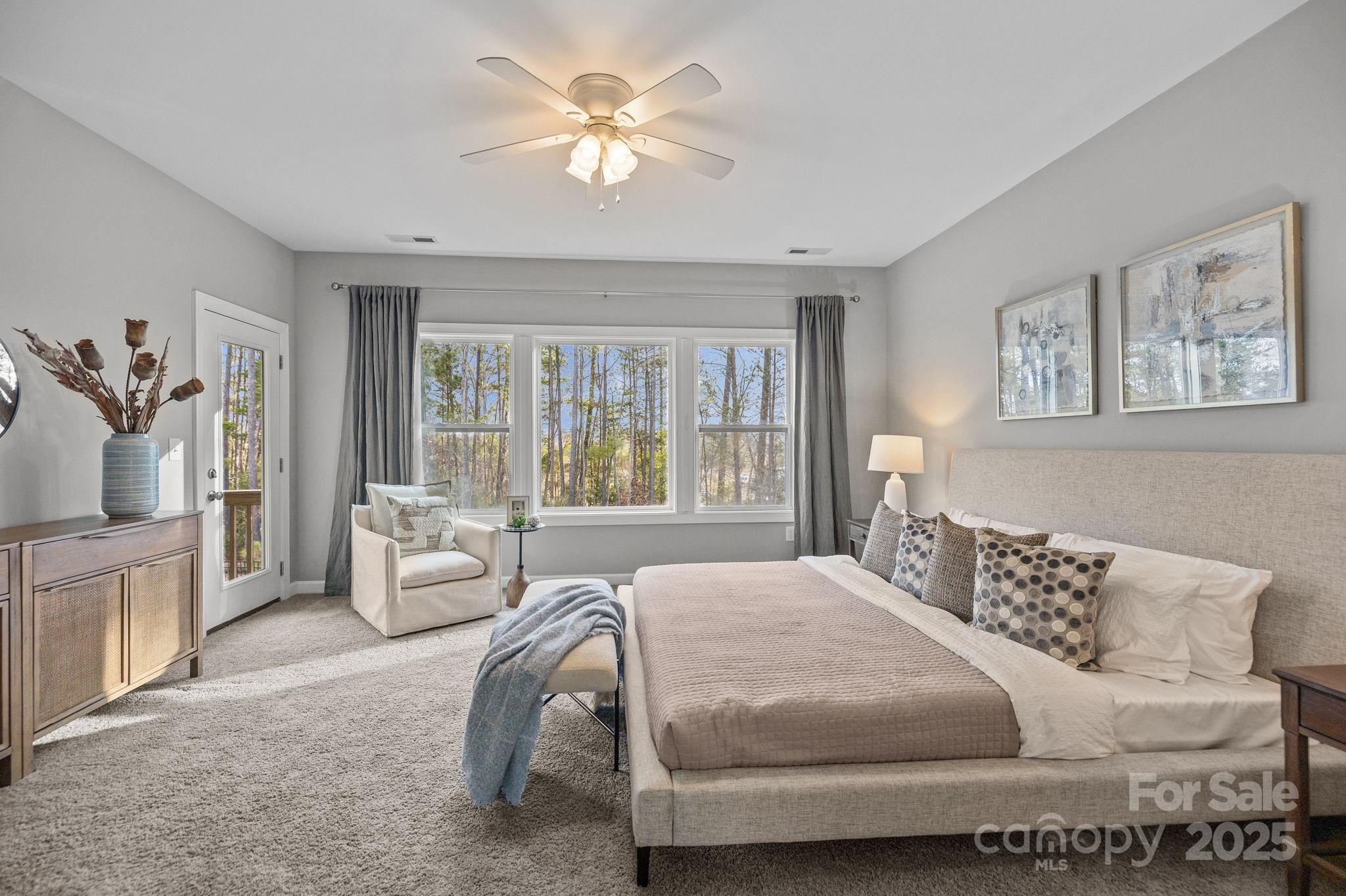 366 Hampton Trail Drive Fort Mill, SC 29708 - Photo 24 of 45 a bedroom with a large bed couch and a window