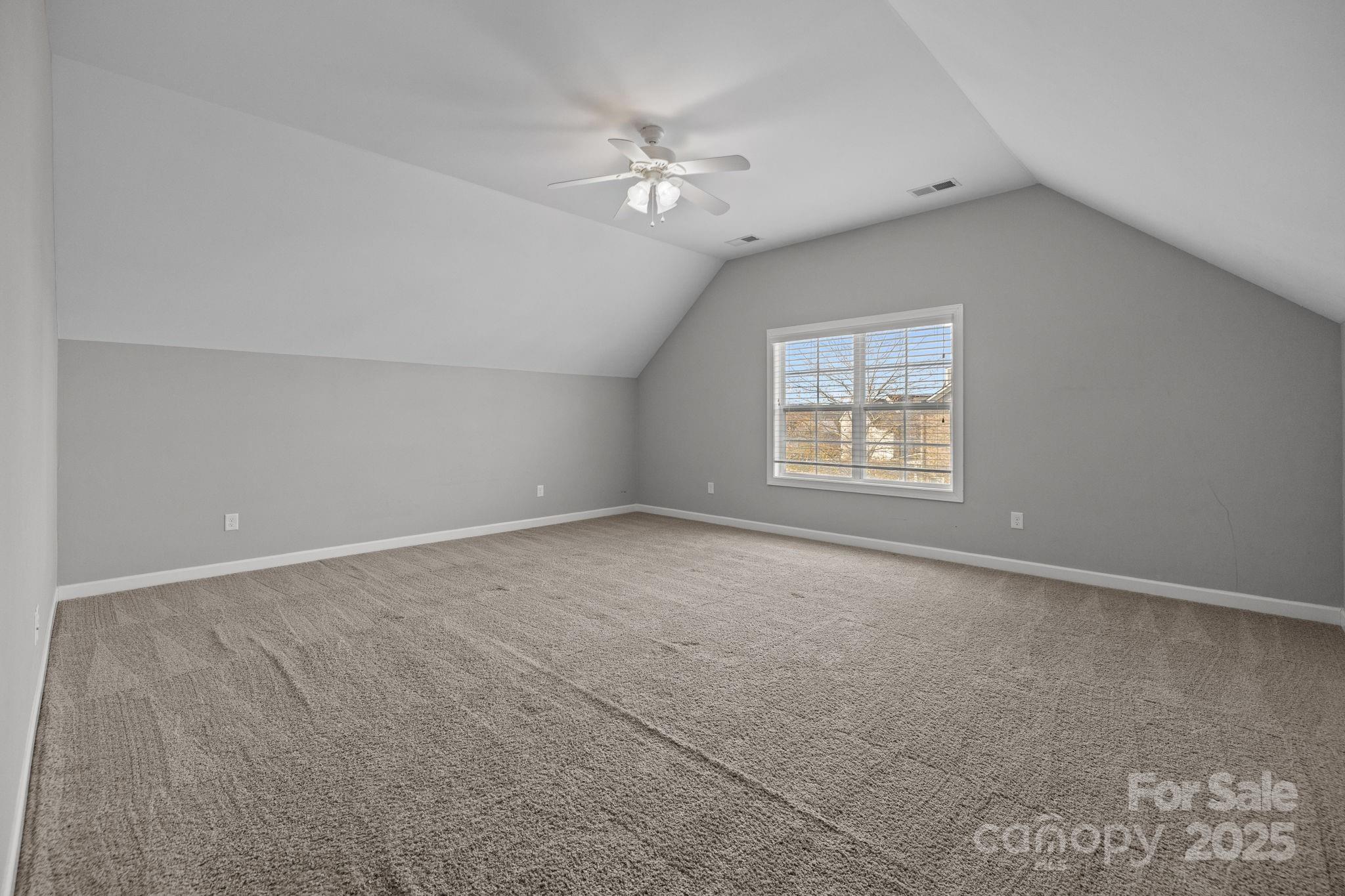 366 Hampton Trail Drive Fort Mill, SC 29708 - Photo 30 of 45 an empty room with windows and fan
