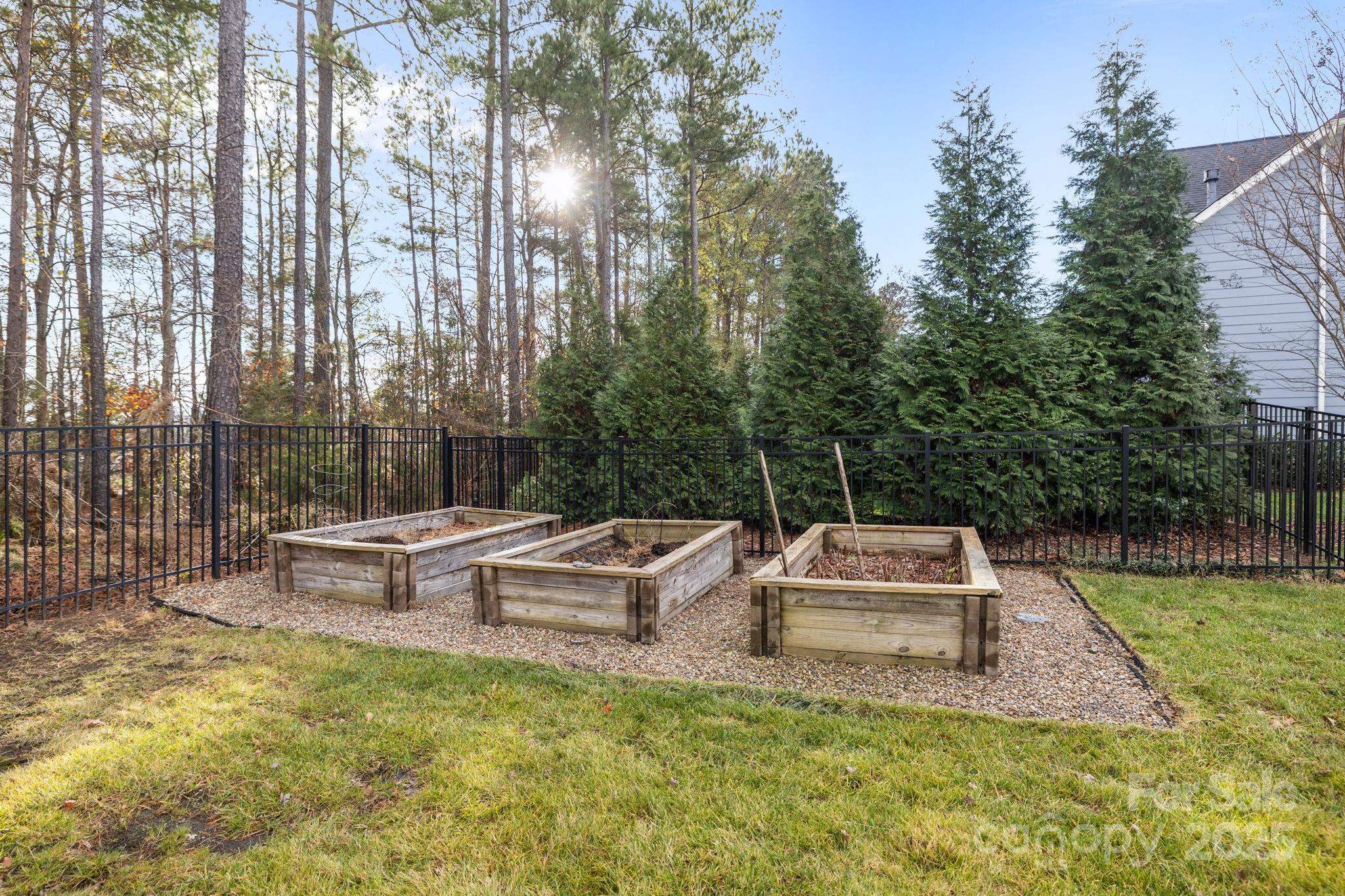 366 Hampton Trail Drive Fort Mill, SC 29708 - Photo 40 of 45 a backyard of a house with fountain table and chairs