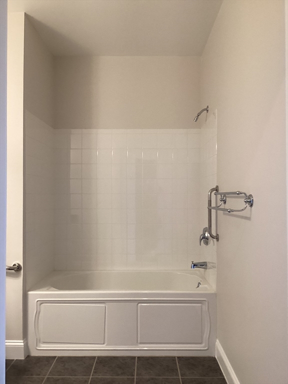 11 Lake Street, Unit 131 Wakefield, MA 01880 - Photo 11 of 11 a bathroom with a bathtub
