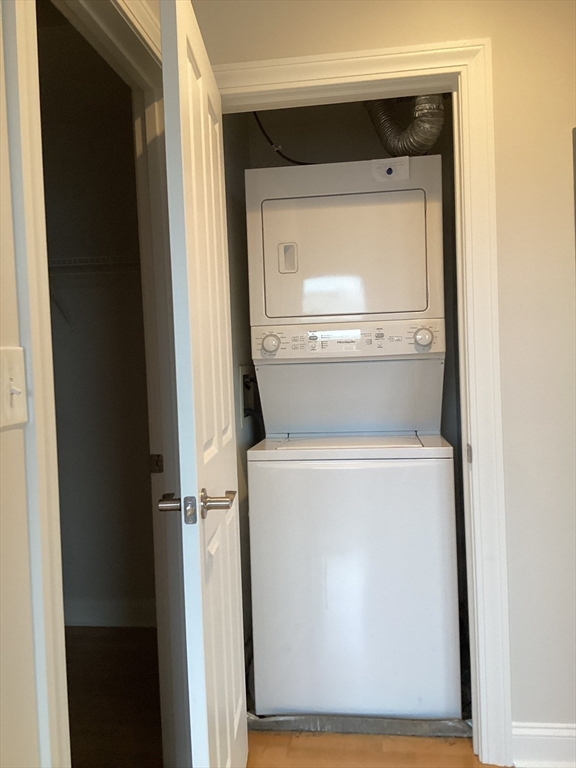 11 Lake Street, Unit 131 Wakefield, MA 01880 - Photo 6 of 11 a utility room with dryer and washer