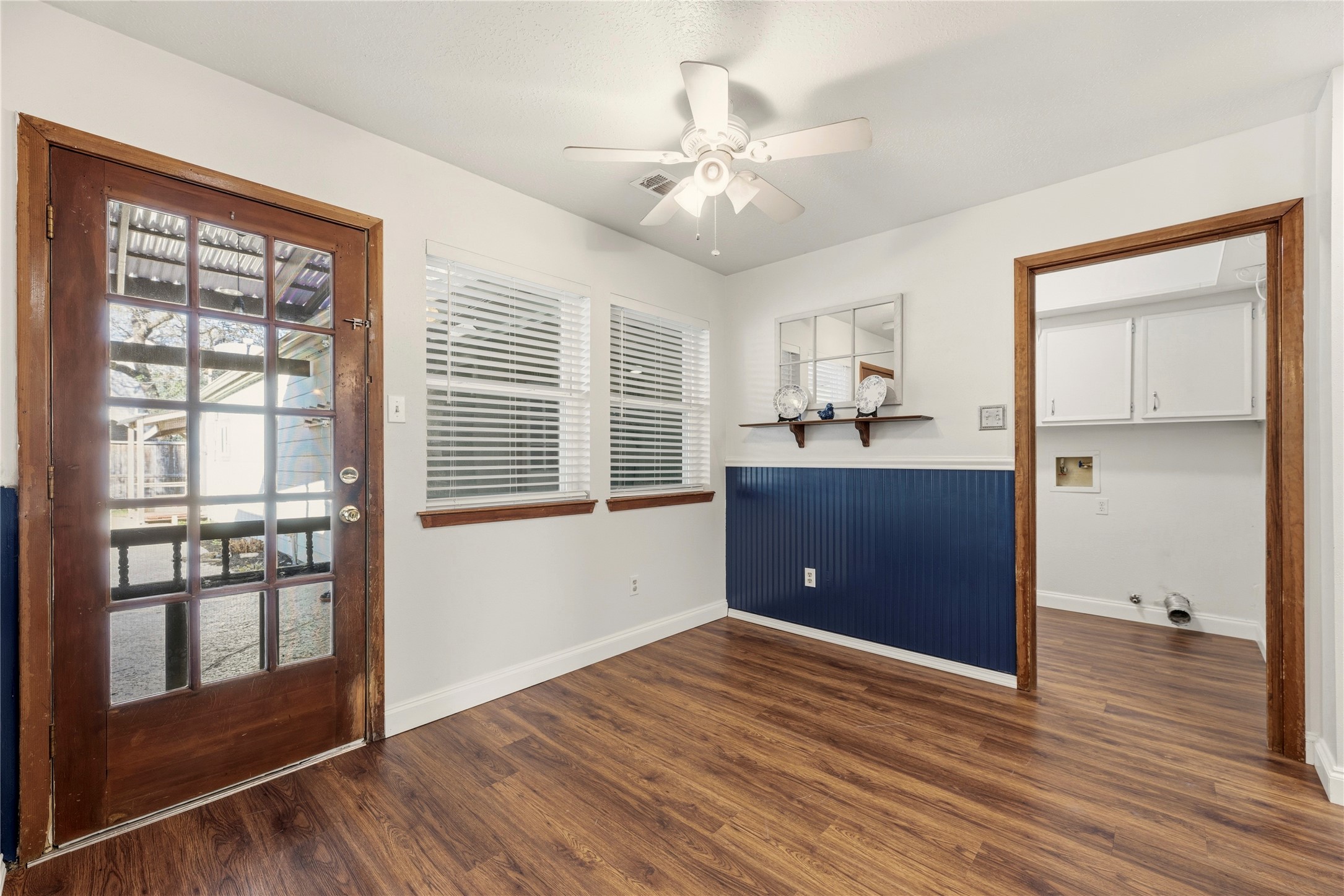 12802 Jarvis Road Cypress, TX 77429 - Photo 13 of 29 a view of a room with wooden floor and a kitchen space