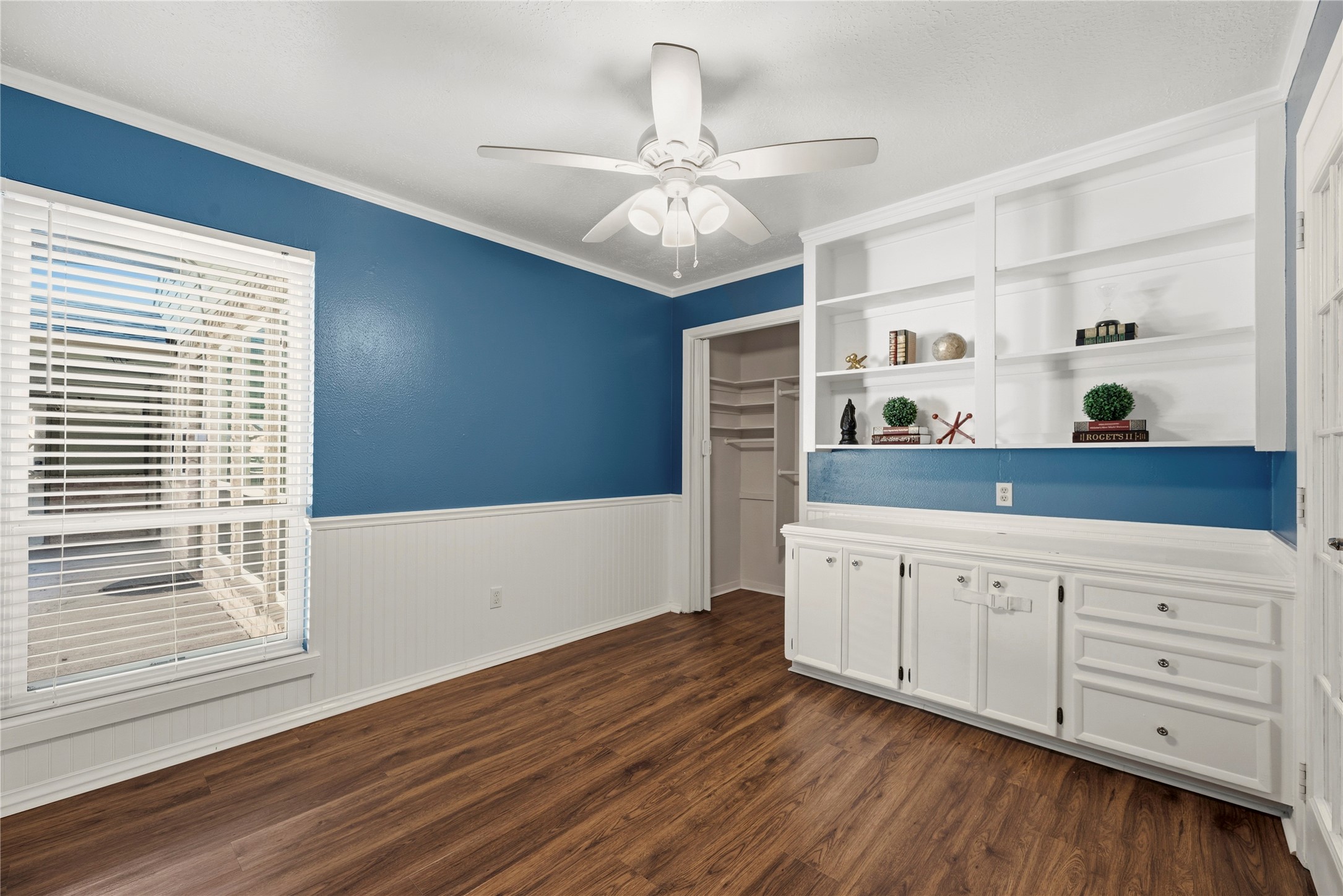 12802 Jarvis Road Cypress, TX 77429 - Photo 20 of 29 a view of a kitchen with wooden floor and cabinets
