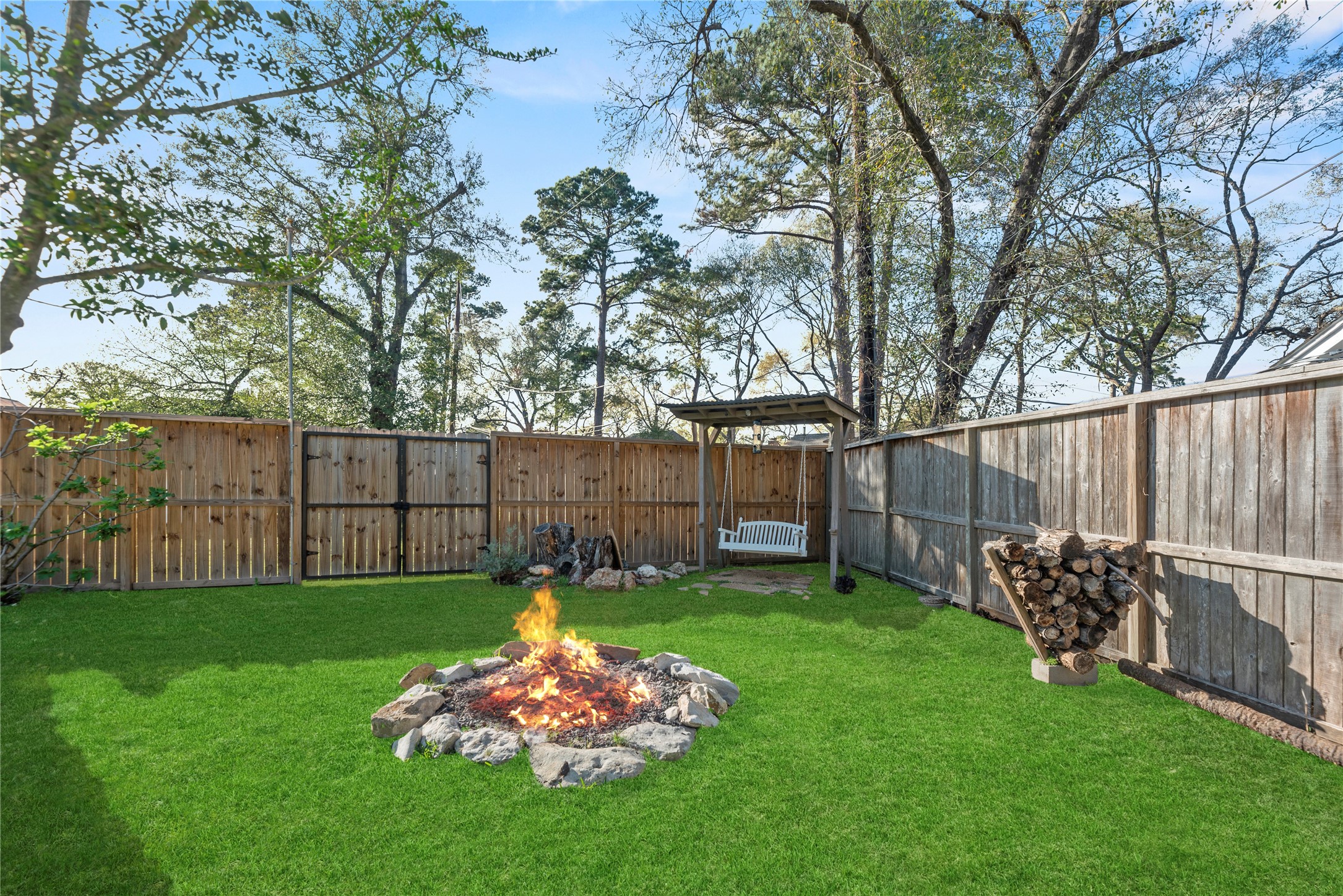 12802 Jarvis Road Cypress, TX 77429 - Photo 22 of 29 a garden with wooden fence
