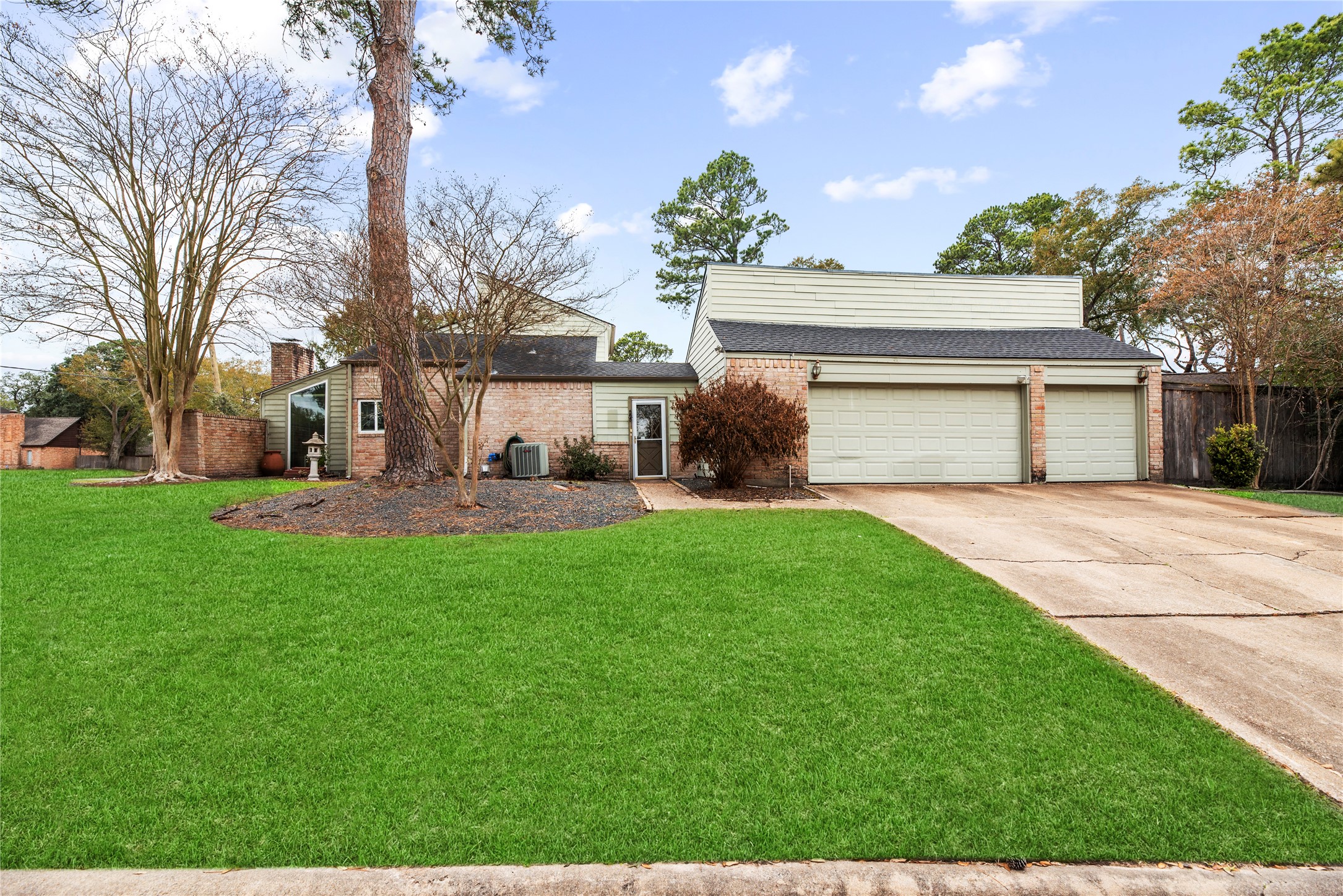 12802 Jarvis Road Cypress, TX 77429 - Photo 4 of 29 a front view of a house with garden