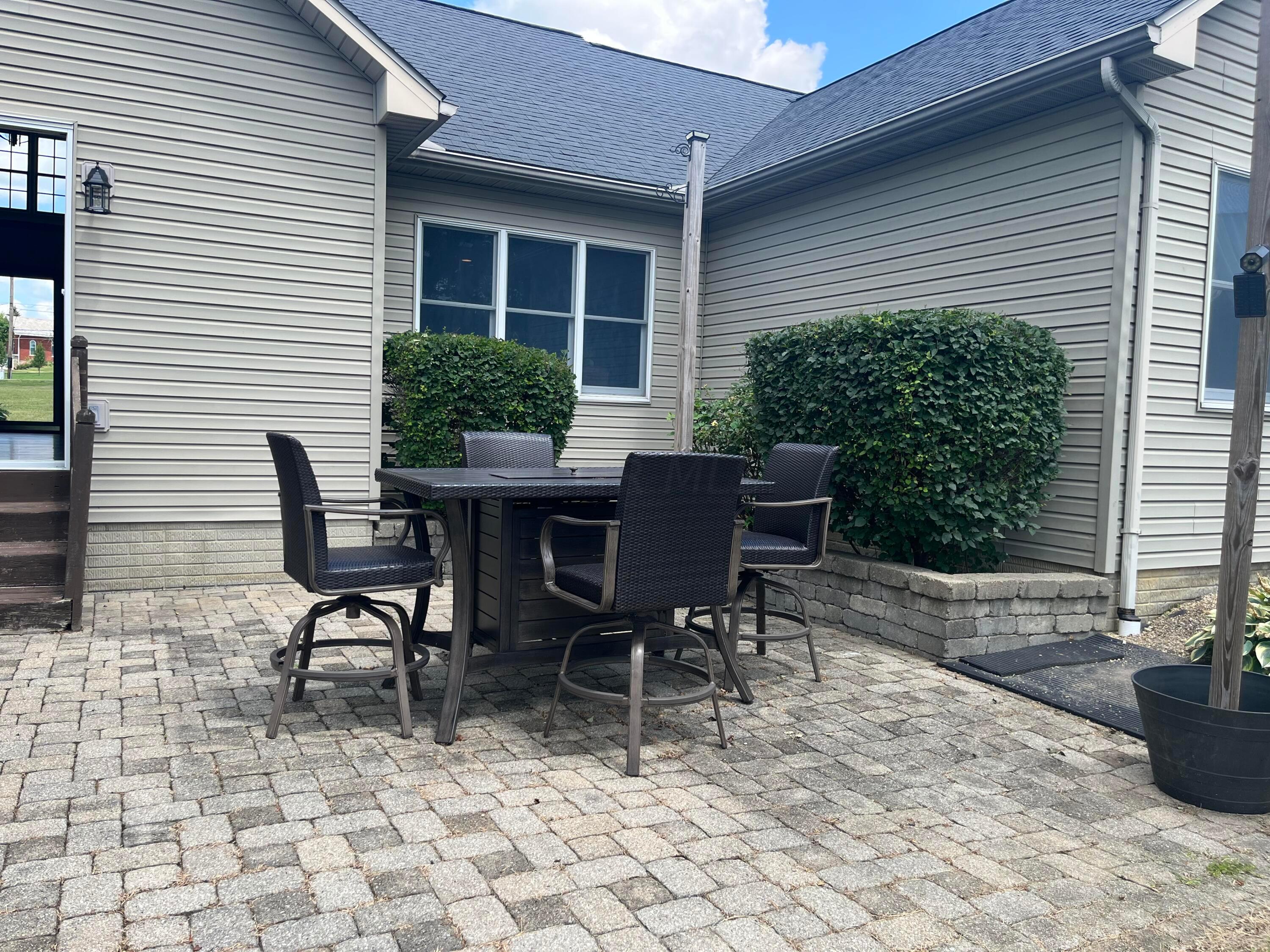 8857 Ringgold Fairfield Road Circleville, OH 43113 - Photo 23 of 36 Paver patio off of living room