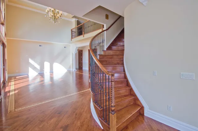 a view of entryway with wooden floor