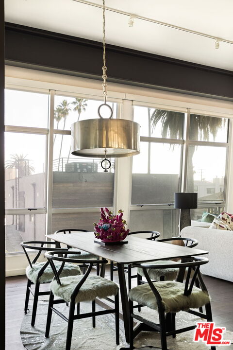 1513 9th Street, Unit 3 Santa Monica, CA 90401 - Photo 11 of 29 a dining room with furniture and window