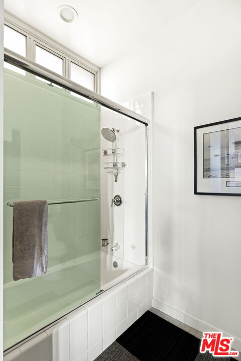 1513 9th Street, Unit 3 Santa Monica, CA 90401 - Photo 21 of 29 a bathroom with a shower and a sink