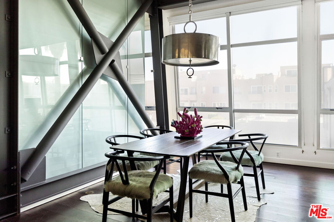 1513 9th Street, Unit 3 Santa Monica, CA 90401 - Photo 10 of 29 a view of a dining room with furniture window and wooden floor