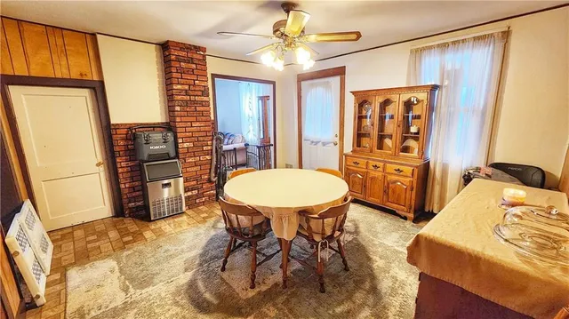 a bed room with a bed and a chandelier