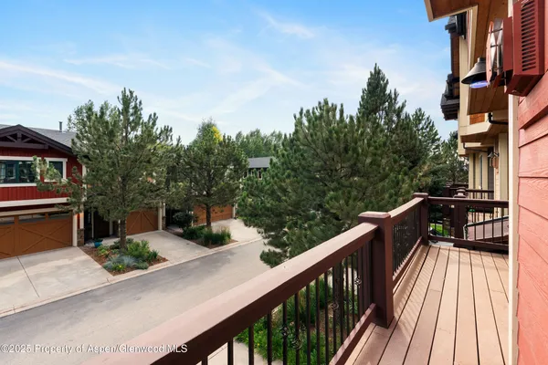 a view of balcony with furniture