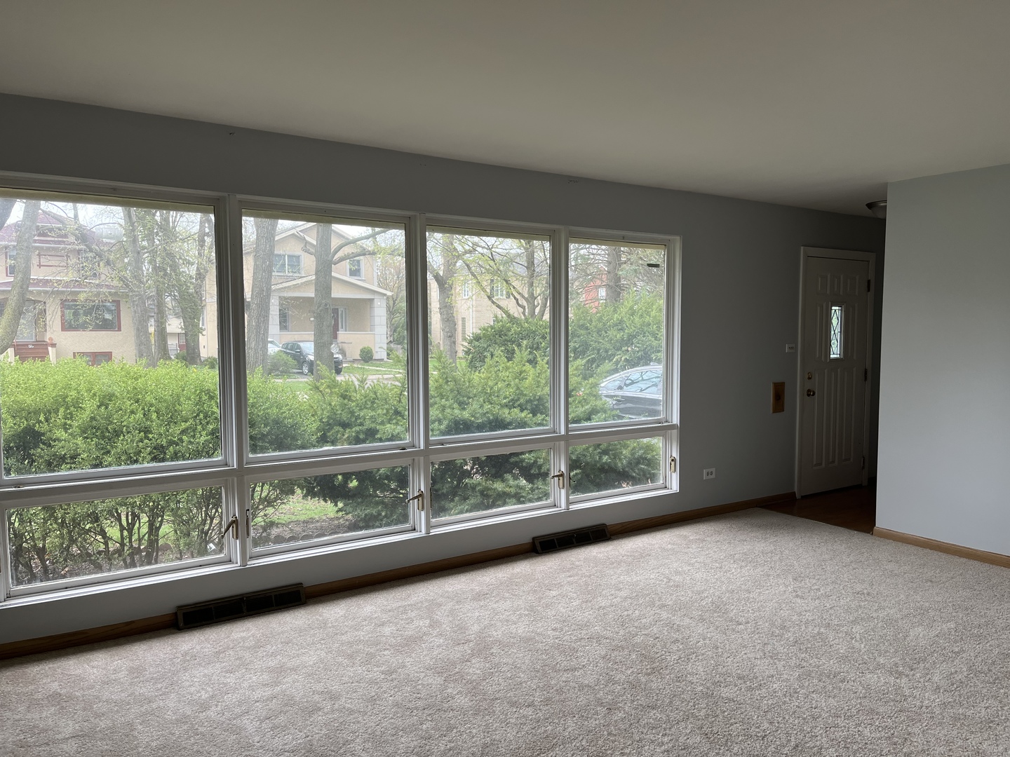 393 Herrick Road Riverside, IL 60546 - Photo 8 of 36 wooden floor in an empty room with a window