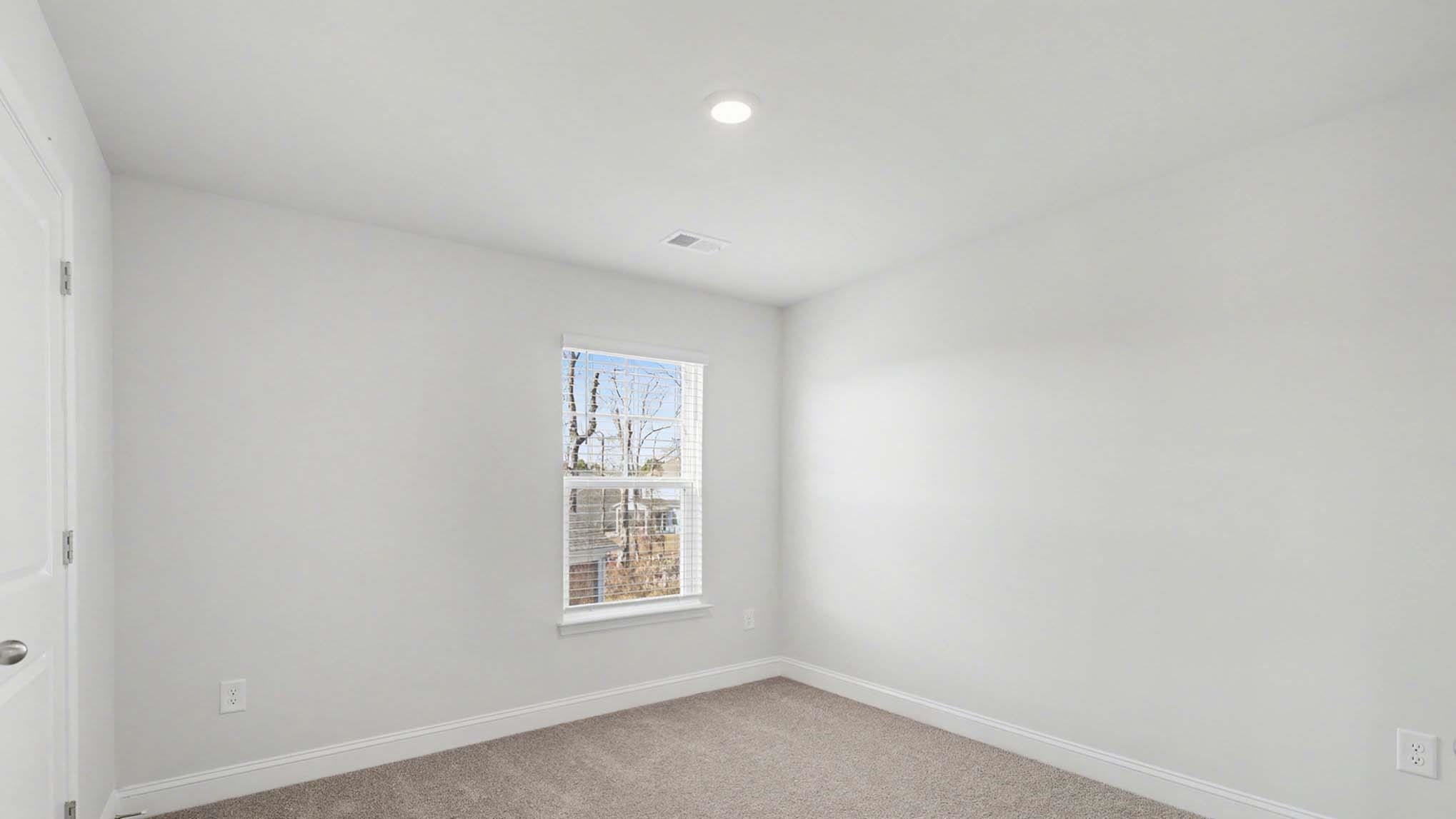 184 Bjorn Way Loris, SC 29569 - Photo 23 of 32 Empty room featuring light colored carpet and recessed lighting