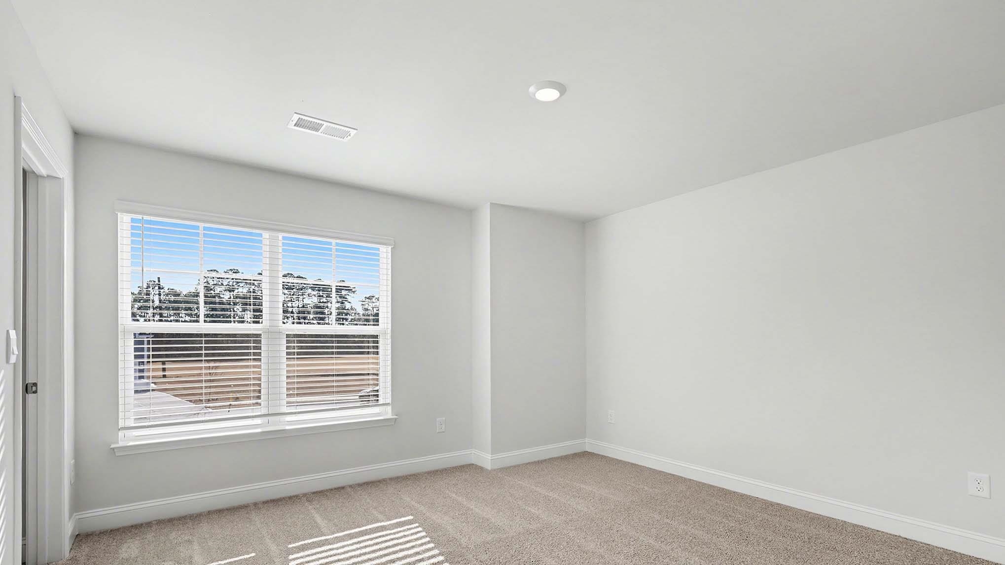184 Bjorn Way Loris, SC 29569 - Photo 28 of 32 Unfurnished room with baseboards and light carpet