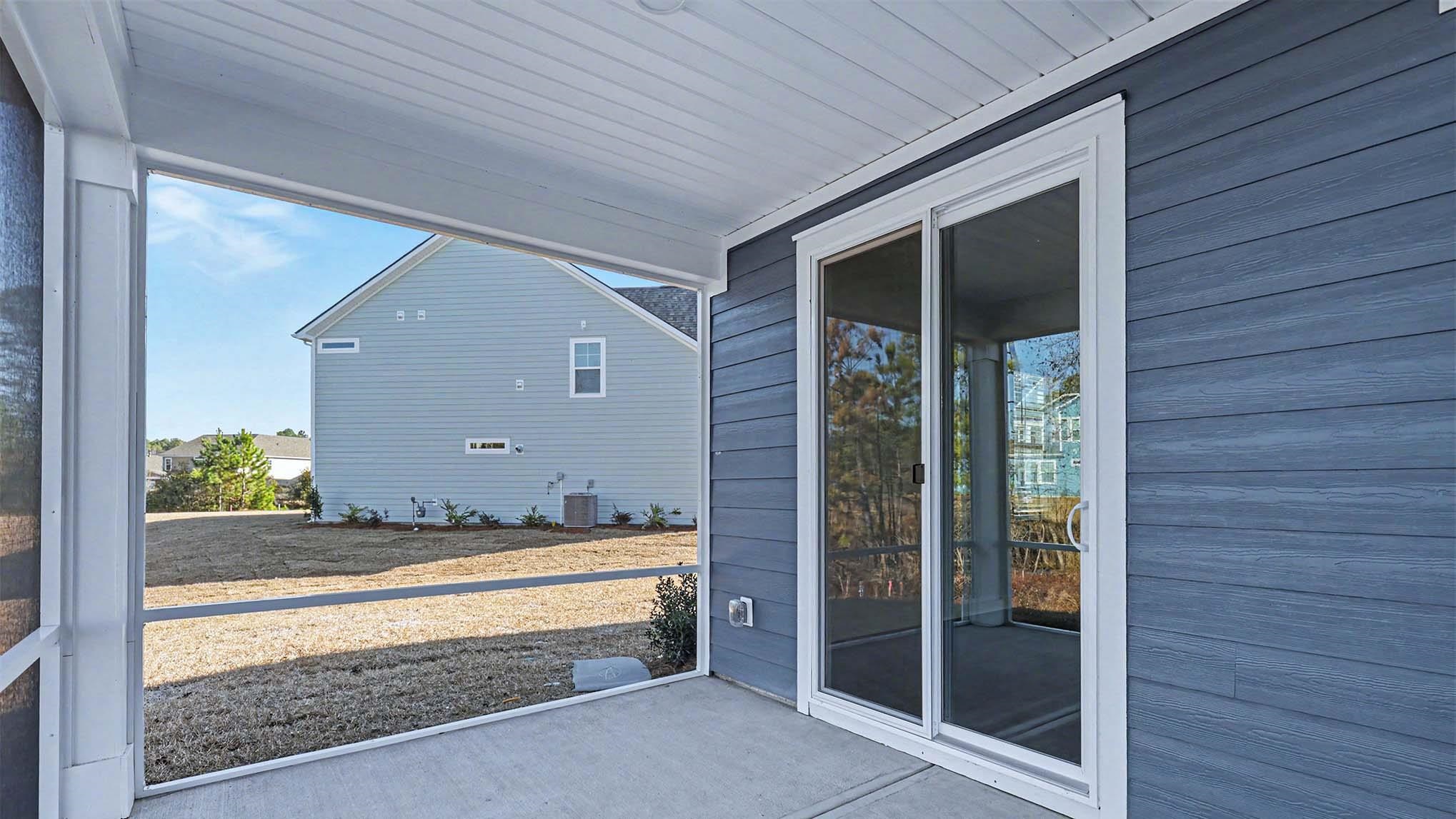 184 Bjorn Way Loris, SC 29569 - Photo 30 of 32 Unfurnished sunroom featuring healthy amount of natural light