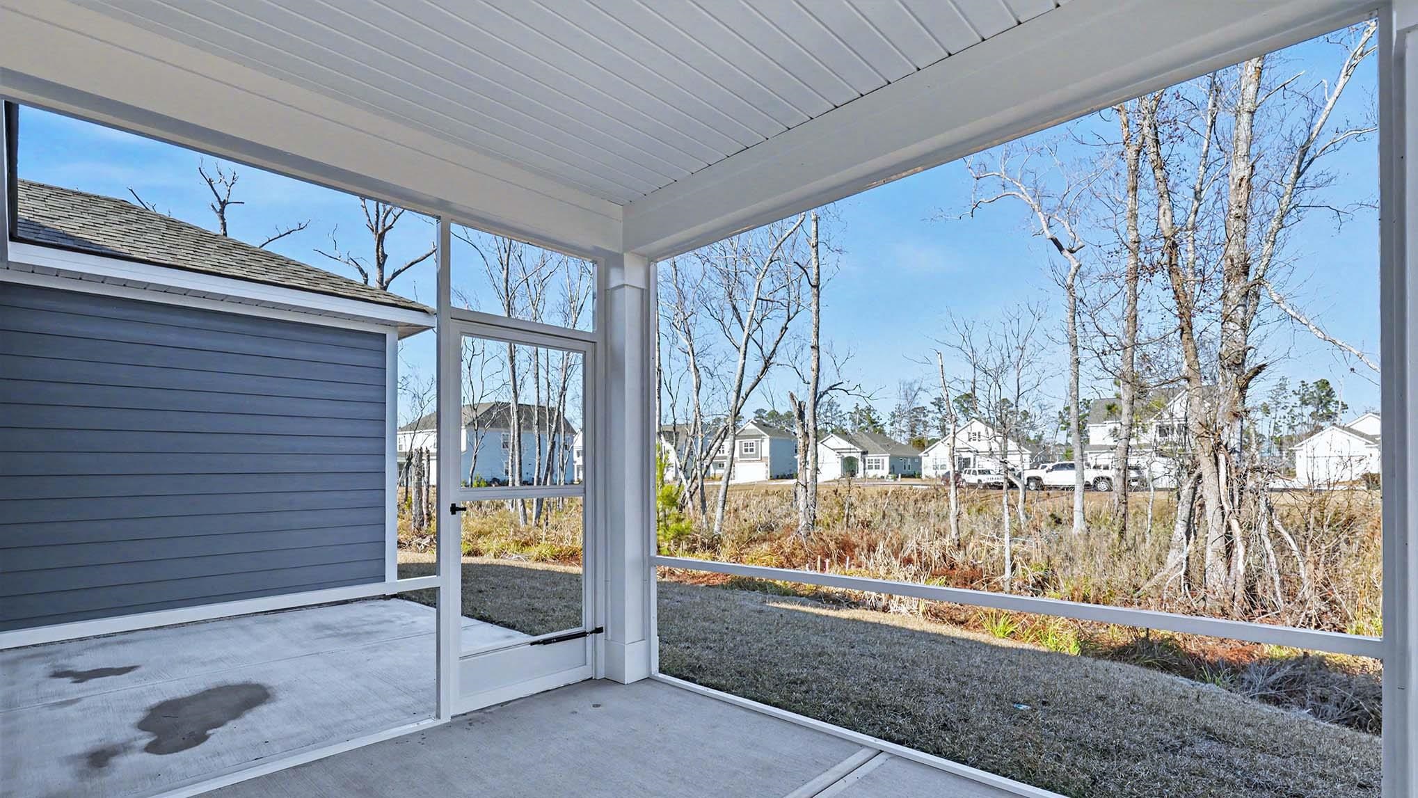 184 Bjorn Way Loris, SC 29569 - Photo 31 of 32 Unfurnished sunroom with a residential view