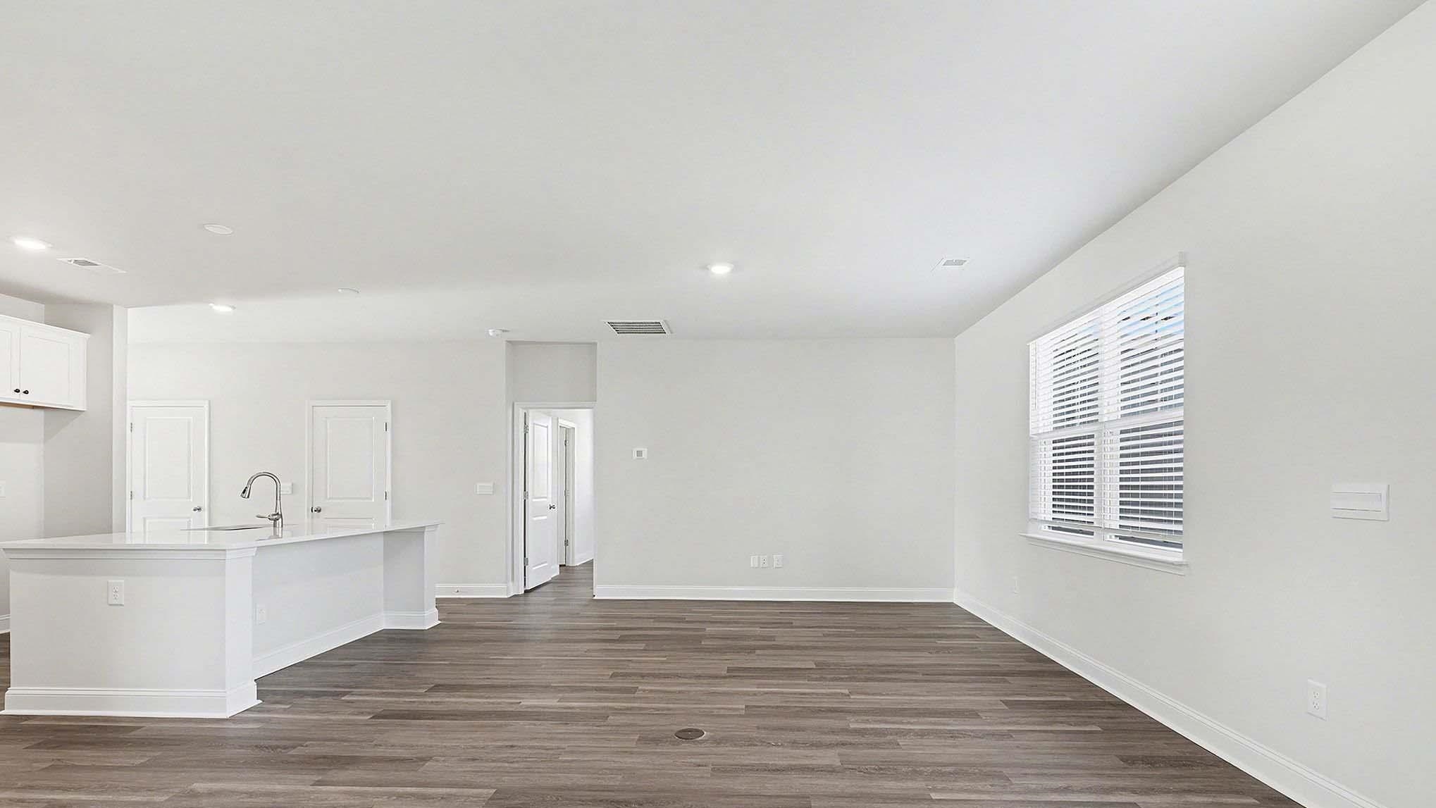 184 Bjorn Way Loris, SC 29569 - Photo 4 of 32 Unfurnished living room with dark wood finished floors and recessed lighting