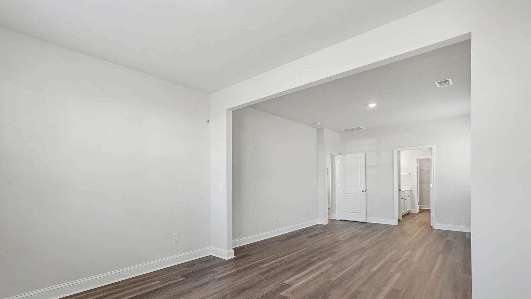 184 Bjorn Way Loris, SC 29569 - Photo 10 of 32 Unfurnished bedroom with baseboards and dark wood finished floors