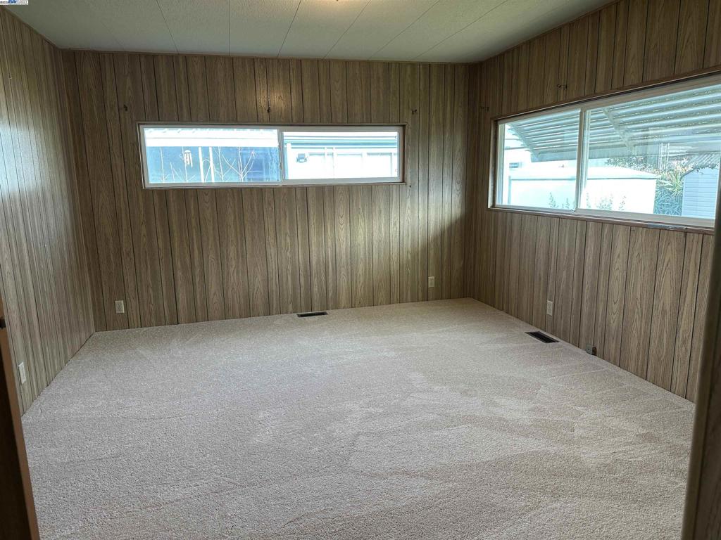 711 Old Canyon Road Fremont, CA 94538 - Photo 28 of 39 an empty room with windows